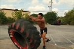 Trainer pushed big tire